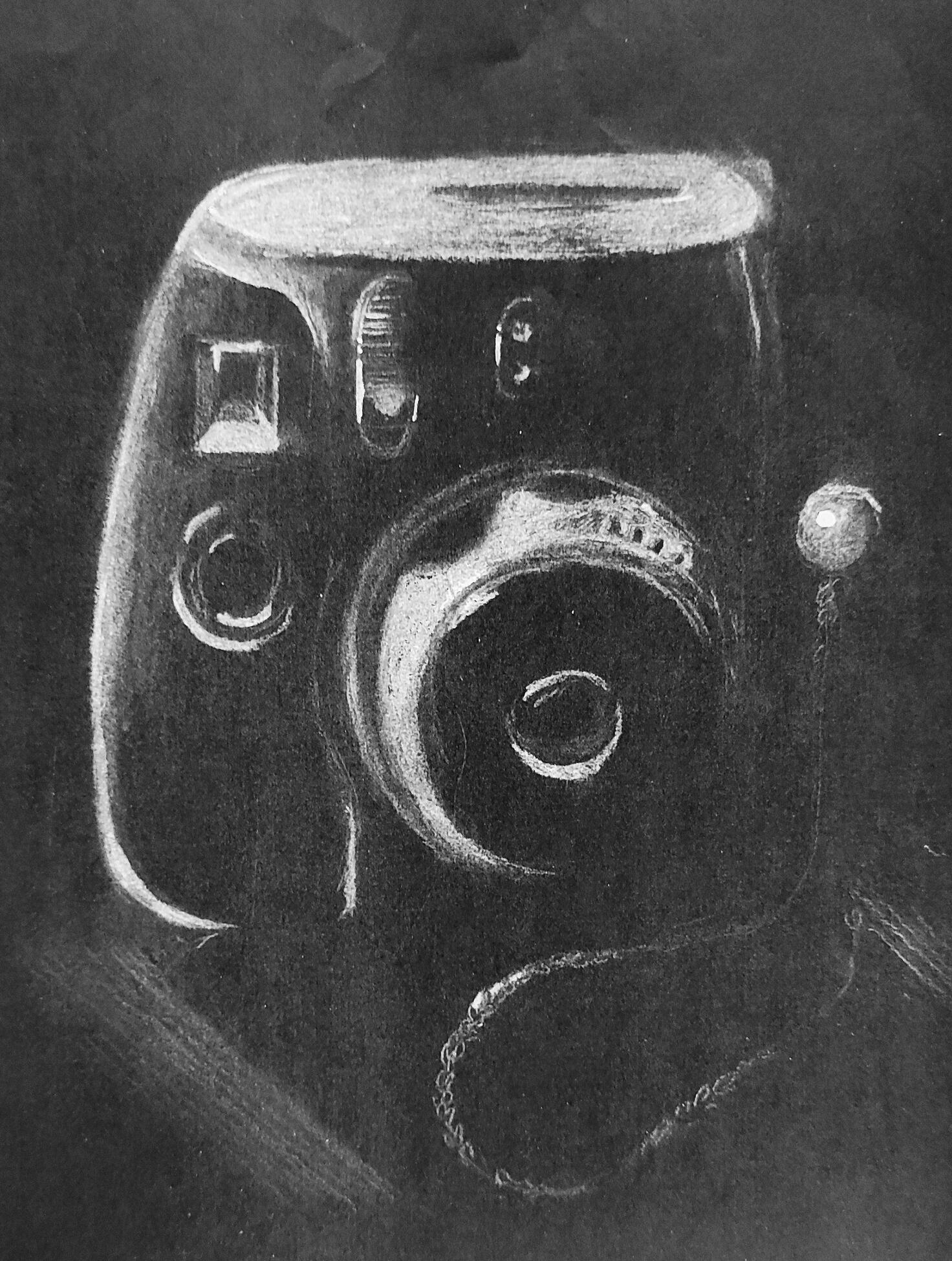 Polaroid : crayon blanc