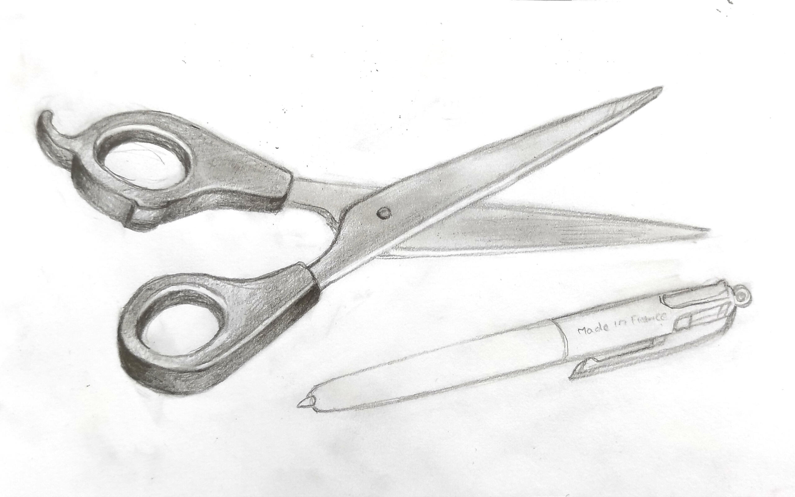 Ciseaux et stylo : crayons gris